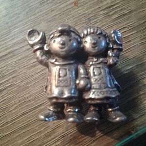 Silver Figurine of Two Children